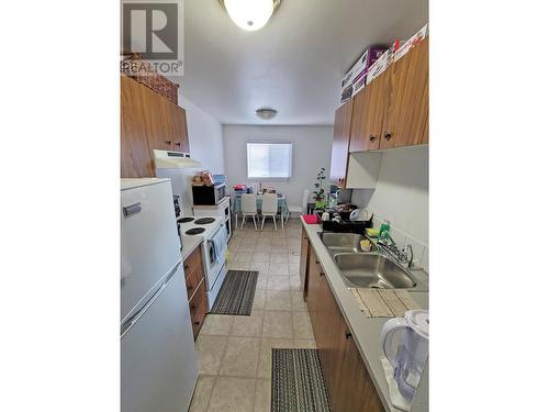 8920 86 Street, Fort St. John, BC - Indoor Photo Showing Kitchen With Double Sink