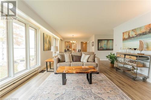 Upper Level Wall of Window Water Views - 2945 Bruce Road 13, Oliphant, ON - Indoor Photo Showing Living Room