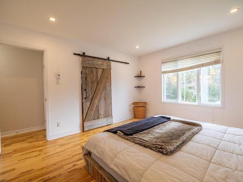 Aerial photo - 104 Rue De La Mésange, Mont-Blanc, QC - Indoor Photo Showing Bedroom