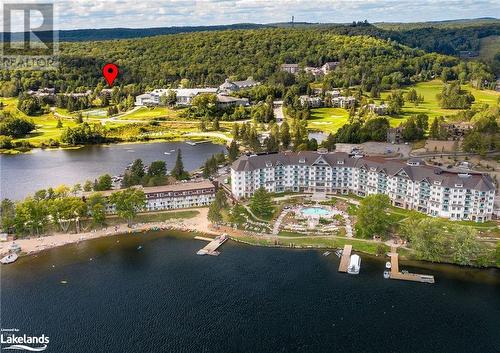 This condo is in the building closest to The  Pavilion with Recreation Centre, Restaurants, and Entertainment Centre - 1235 Deerhurst Drive Unit# 51-208, Huntsville, ON - Outdoor With Body Of Water With View