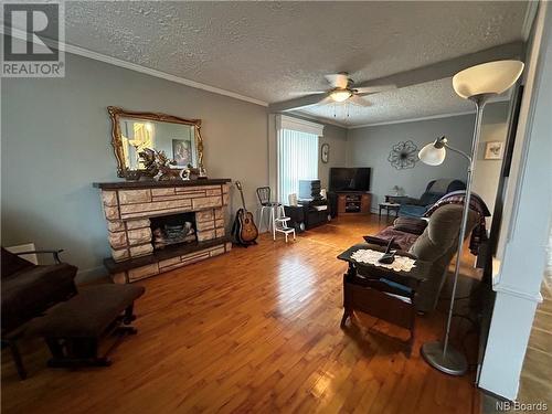 2 Des Ancêtres, Saint-Simon, NB - Indoor Photo Showing Living Room With Fireplace