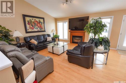 318 Brooks Road, Estevan, SK - Indoor Photo Showing Living Room With Fireplace