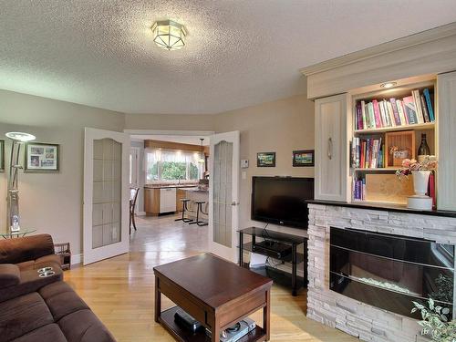 Overall view - 40A  - 40C Av. Des Perdrix, Rivière-Héva, QC - Indoor Photo Showing Living Room With Fireplace