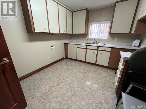 218 Canada Street, Saint-Quentin, NB - Indoor Photo Showing Kitchen With Double Sink