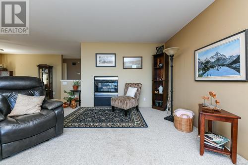 Living room - 5594 7Th St, Union Bay, BC - Indoor Photo Showing Living Room With Fireplace