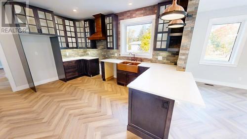 4920 Riverside Avenue, Grand Forks, BC - Indoor Photo Showing Kitchen With Double Sink