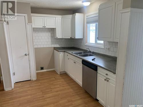 207 Mccarthy Boulevard N, Regina, SK - Indoor Photo Showing Kitchen With Double Sink