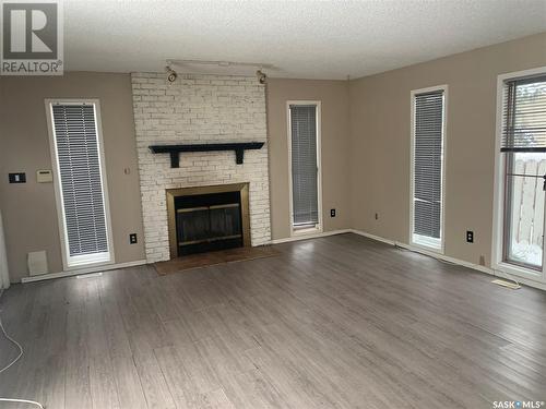 207 Mccarthy Boulevard N, Regina, SK - Indoor Photo Showing Living Room With Fireplace