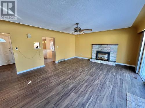 743 Walkem Street, Quesnel, BC - Indoor Photo Showing Living Room With Fireplace