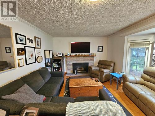 4 Coles Avenue, Steady Brook, NL - Indoor Photo Showing Living Room With Fireplace