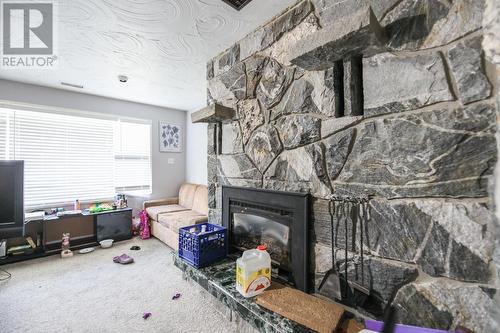 8020 Gravenstein Drive, Osoyoos, BC - Indoor With Fireplace