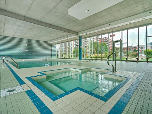 Pool - 108-1200 Rue St-Jacques, Montréal (Ville-Marie), QC - Indoor Photo Showing Other Room With In Ground Pool