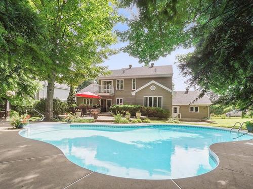 Back facade - 1113 Rue Émile-Nelligan, Mont-Saint-Hilaire, QC - Outdoor With In Ground Pool With Backyard With Exterior