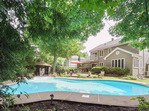 Pool - 1113 Rue Émile-Nelligan, Mont-Saint-Hilaire, QC - Outdoor With In Ground Pool With Backyard