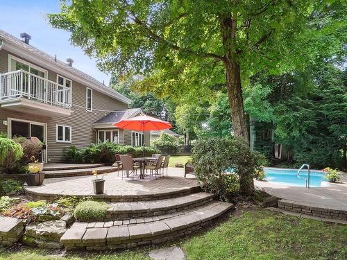 Back facade - 1113 Rue Émile-Nelligan, Mont-Saint-Hilaire, QC - Outdoor With In Ground Pool
