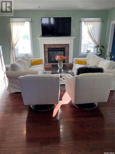 5 Coleman Crescent, Kindersley, SK - Indoor Photo Showing Living Room With Fireplace