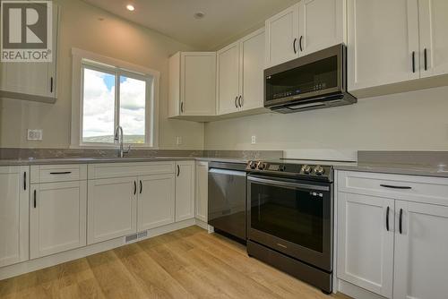 15 555 Wotzke Drive, Williams Lake, BC - Indoor Photo Showing Kitchen