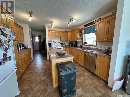 115 Carson Bay, Lampman, SK - Indoor Photo Showing Kitchen With Double Sink