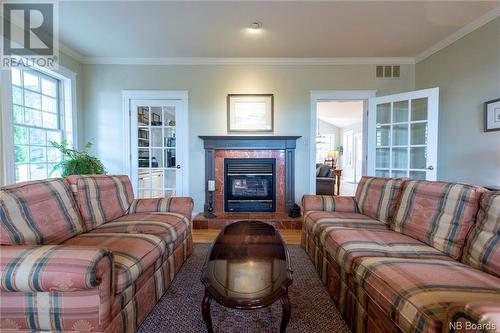 185 Pleasant Avenue, Sussex, NB - Indoor Photo Showing Living Room With Fireplace