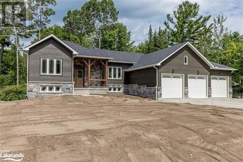 Home Previously Built - similar model - Lot 13 Voyageur Drive, Tiny, ON - Outdoor With Deck Patio Veranda With Facade