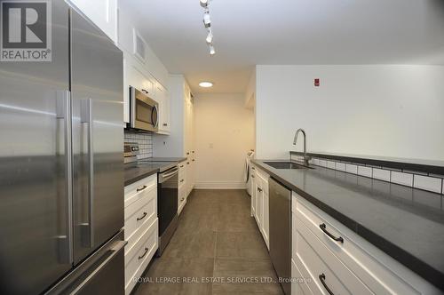 #239 -22 Southport St, Toronto, ON - Indoor Photo Showing Kitchen With Upgraded Kitchen