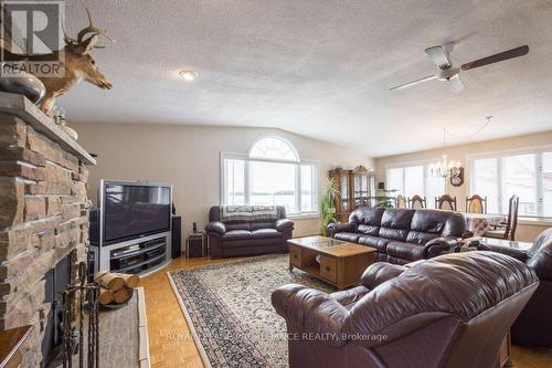 11438 C Loyalist Pkwy N, Prince Edward County, ON - Indoor Photo Showing Living Room With Fireplace