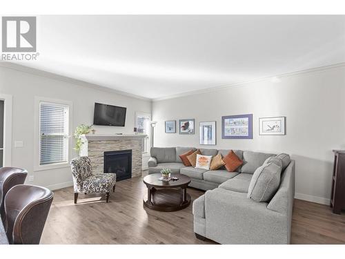 2068 Mallard Drive, Westbank, BC - Indoor Photo Showing Living Room With Fireplace