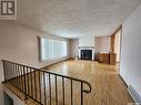 571 13Th Street Ne, Weyburn, SK  - Indoor With Fireplace 