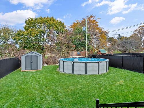 Backyard - 8 Rue Pesant, Saint-Isidore, QC - Outdoor With Above Ground Pool With Backyard