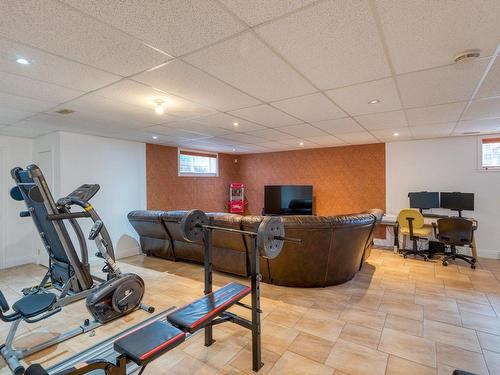Salle familiale - 39 Place Rodolphe-Duguay, Drummondville, QC - Indoor Photo Showing Gym Room