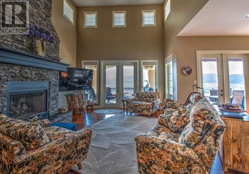 304 Cordon Place, Vernon, BC - Indoor Photo Showing Living Room With Fireplace