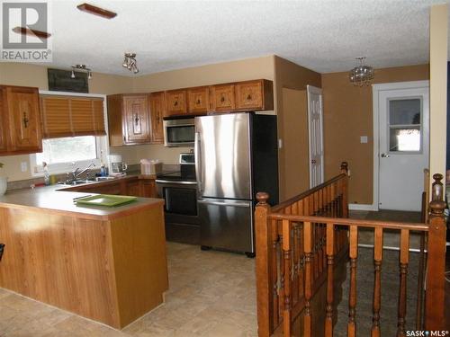 26 Drobot Street, Quill Lake, SK - Indoor Photo Showing Kitchen With Double Sink