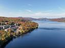 Aerial photo - 902-121 Rue Cuttle, Mont-Tremblant, QC  - Outdoor With Body Of Water With View 