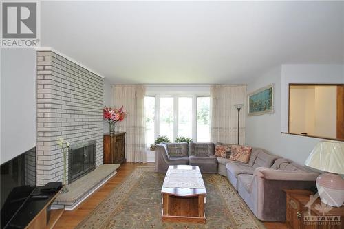 10 Palsen Street, Ottawa, ON - Indoor Photo Showing Living Room With Fireplace