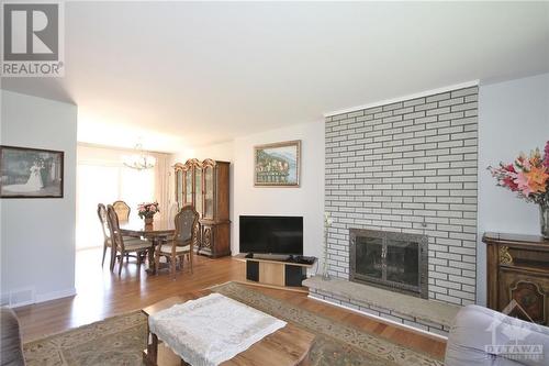 10 Palsen Street, Ottawa, ON - Indoor Photo Showing Living Room With Fireplace