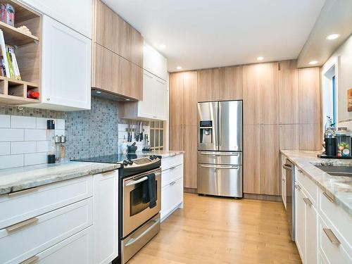 Kitchen - 50 Cer. Maple, Dollard-Des-Ormeaux, QC - Indoor Photo Showing Kitchen With Upgraded Kitchen
