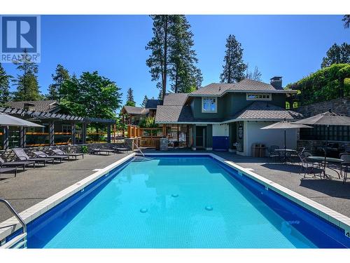 251 Predator Ridge Drive Unit# 18, Vernon, BC - Outdoor With In Ground Pool With Backyard