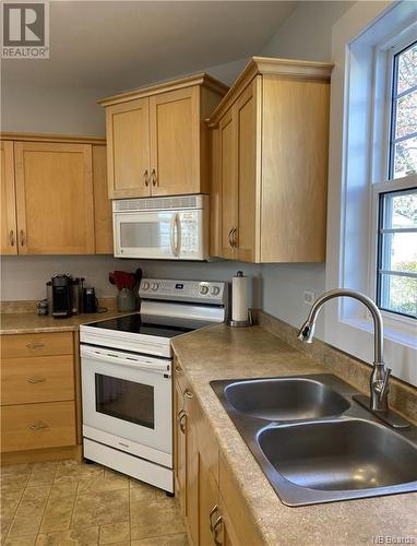 28 Porter Street, St. Stephen, NB - Indoor Photo Showing Kitchen With Double Sink