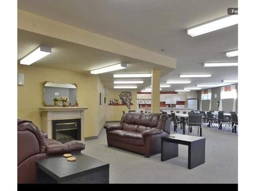 Common room - 313-7300 3E Avenue O., Québec (Charlesbourg), QC - Indoor With Fireplace