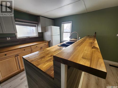 73 3Rd Avenue E, Central Butte, SK - Indoor Photo Showing Kitchen With Double Sink