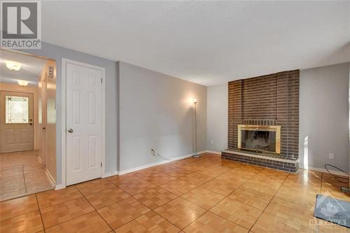 16 Eastpark Drive, Ottawa, ON - Indoor Photo Showing Living Room With Fireplace