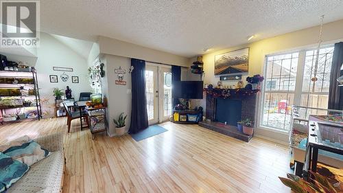 9004 112 Avenue, Fort St. John, BC - Indoor With Fireplace