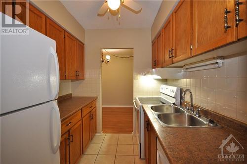 15 Findlay Avenue Unit#104, Carleton Place, ON - Indoor Photo Showing Kitchen With Double Sink