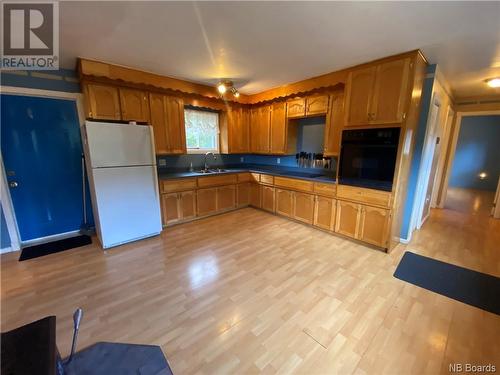 669 Route 172, Back Bay, NB - Indoor Photo Showing Kitchen With Double Sink