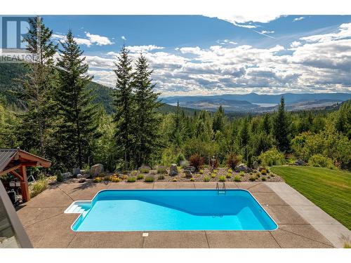 8100/8104 Silver Star Road, Vernon, BC - Outdoor With In Ground Pool With View