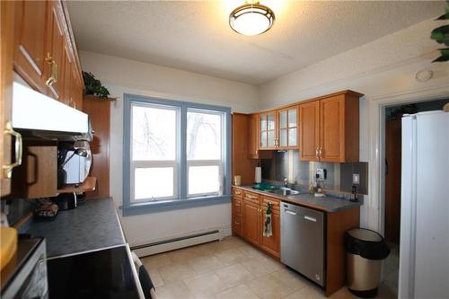 1305 Halcrow Avenue, The Pas, MB - Indoor Photo Showing Kitchen With Double Sink