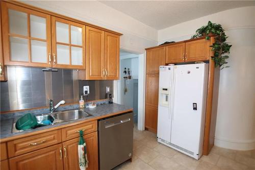 1305 Halcrow Avenue, The Pas, MB - Indoor Photo Showing Kitchen With Double Sink