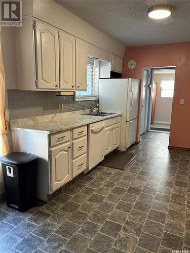 209 Prouse Street, Kelvington, SK - Indoor Photo Showing Kitchen With Double Sink