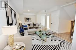 Virtual Staged Photo Lower Level Family Room - 