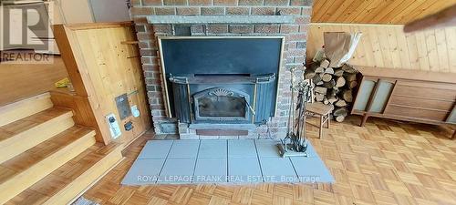 94 Mikolla Rd, Marmora And Lake, ON - Indoor With Fireplace